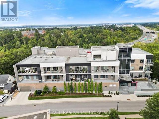 404 77 Yates Street, St. Catharines Downtown, ON, L2R 0C4 condo for sale | Listing ID X13681 | Royal LePage