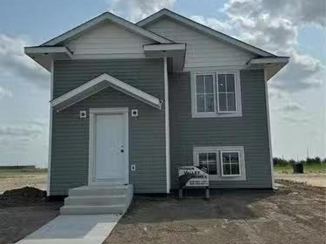 421 Eldorado Street, Warman, SK, S0K 4S0 house for sale Lis.