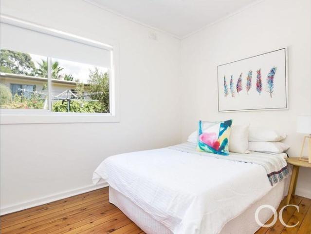 Open the Door to Peaceful Living in a Leafy Creekside Setting