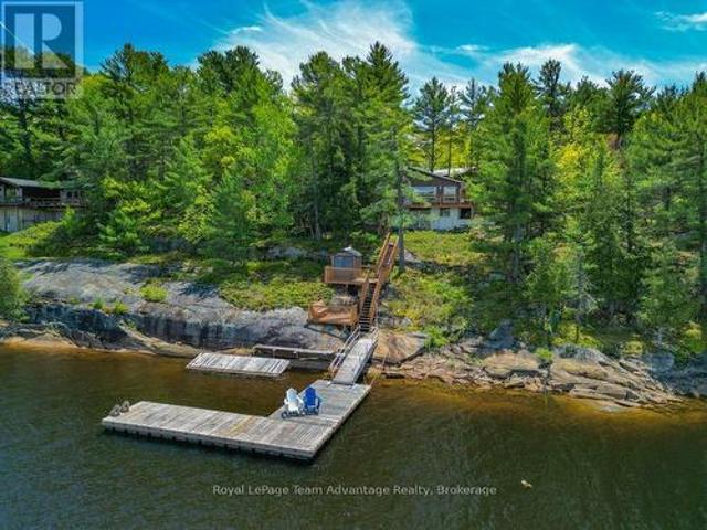 47 Ridgeway Drive, Carling, ON, P0G 1G0 Luxury House for sale | Listing ID X12188 | Royal LePage Carriage Trade Luxury Properties