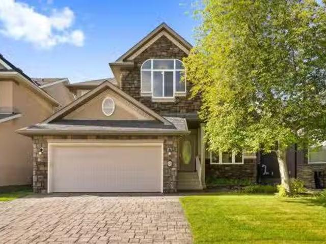 48 Strathlea Close Sw, Calgary, AB, T3H 5C6 house for sale.