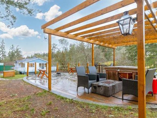 4 BED 2 BATH WORKSHOP PLENTY OF STRUCTURES OUT BUILDINGS AND G