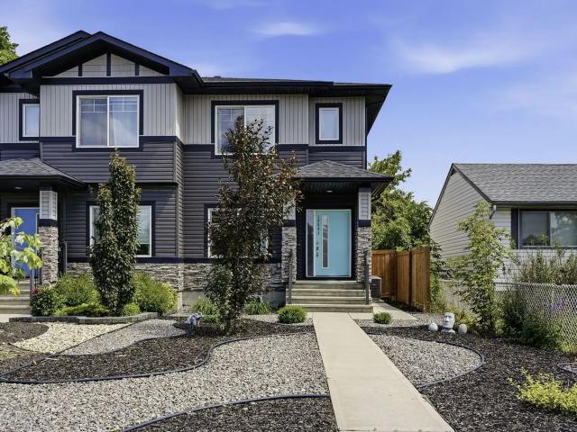4 Bed / 3.5 Bath Half Duplex in Canora | Double Garage + Central A/C | $2,650