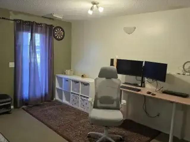 4 Bedroom Condo Chestermere AB 104181370