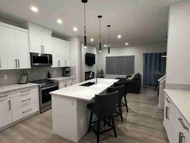 4 Bedroom Apartment for Rent at 7426 Elmer Rd Nw, Edmonton, AB T6M 1K1