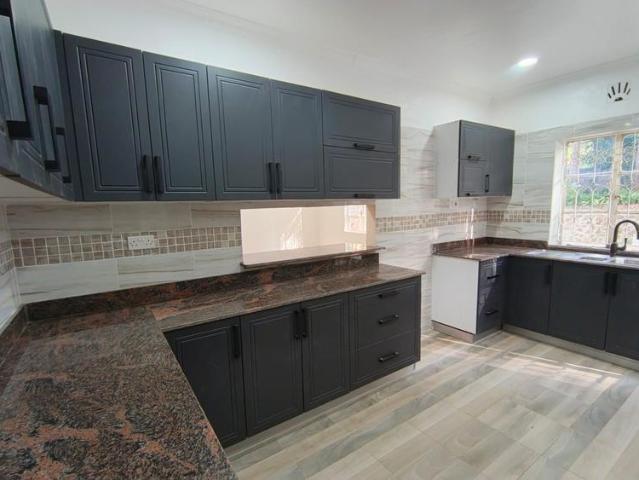 4 bedroom stand alone bungalow on 0.5 acre