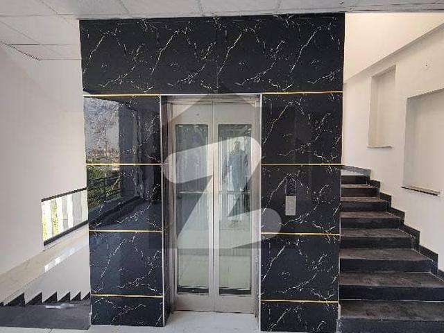 4 floors long length building, 2 washrooms on each floor, kitchen parking