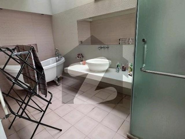 4 kanal 2 kanal lawn+ 2 kanal house elegant and fully furnished super hot located bungalow is available in the best block of dha lahore. DHA Phase 6