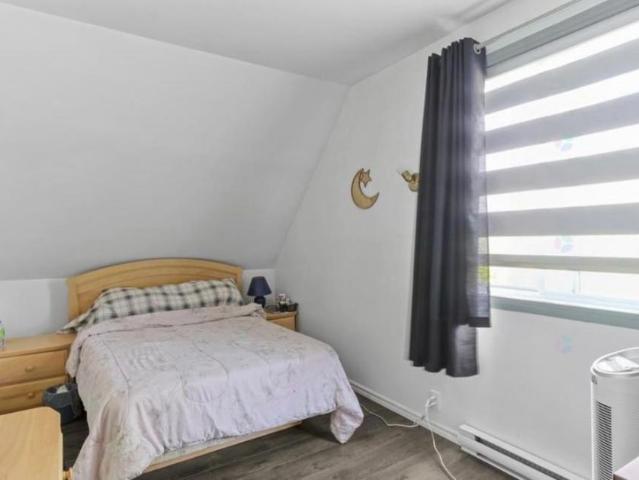 4 ½ lumineux à Châteauguay – Jardin privatif, rivière et stationnement inclus