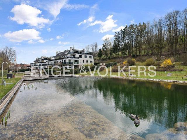 4 Zimmer Neubau Gartenwohnung mit 340 m² Garten und Seeblick