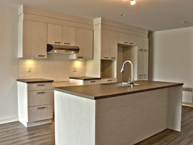 4 1/2 Moderne Stationnement Interieur