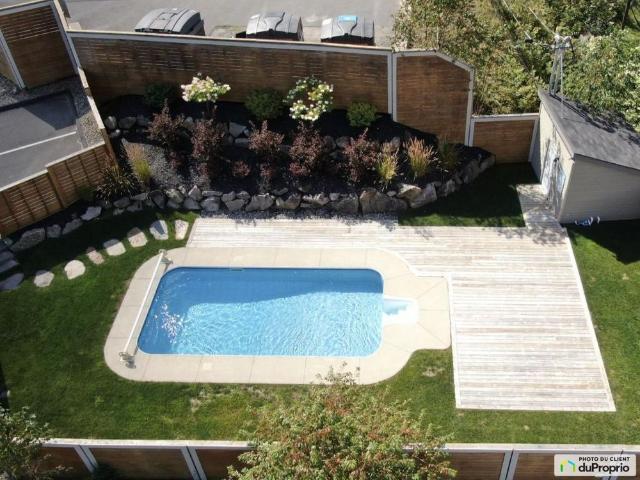 4 1/2 boisé avec piscine à Mont Tremblant Saint Jovite