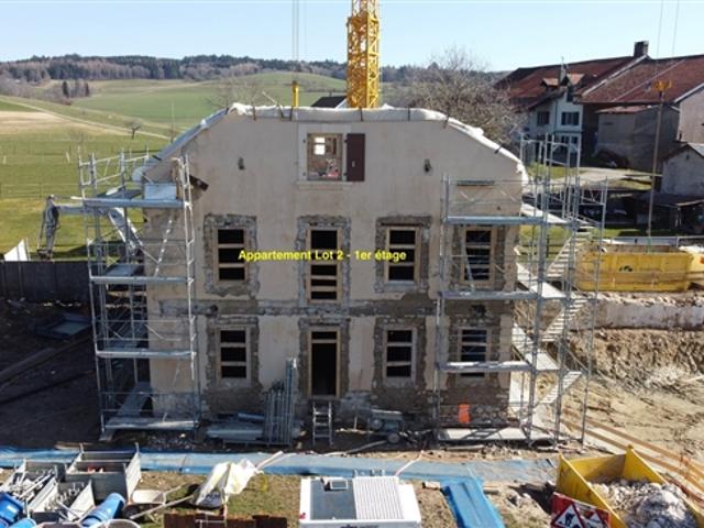 Grundstück 2 – Neue Wohnung mit Balkon UND Garten