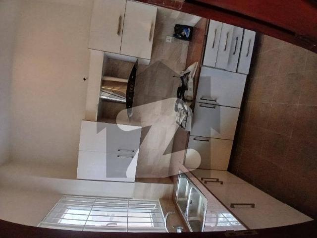 500 yard like new sami furnished bungalow available for rent with basement, 48kv solar system, swimming pool, cctv camera and aro plant