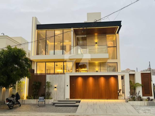 500 yards Brand New Top Quality Bungalow with Pool Basement Semi Furnished Available for tasteful buyer