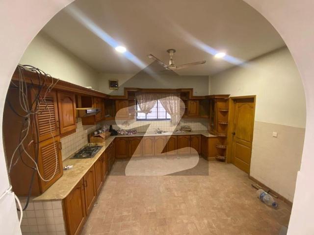 500 Yards Bungalow Featuring A 5 Bedroom Layout With 2 Well Equipped Kitchens, Dedicated Line Water, And CCTV Camera Surveillancez DHA Phase 7