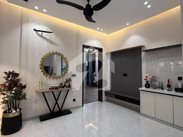 5 marla elegant & semi furnished super hot located bungalow is available in dha, lahore