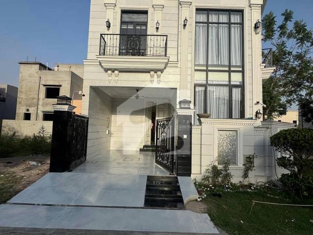 5 marla elegant & semi furnished super hot located bungalow is available in dha, lahore