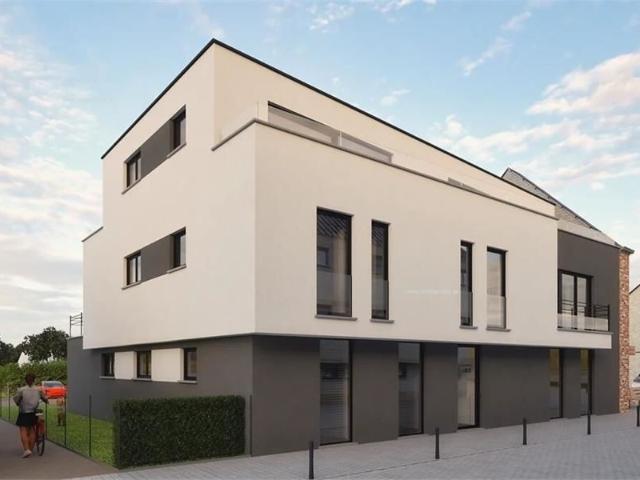 5 nieuwbouwappartementen, 8 autostaanplaatsen en een loods te centrum Haaltert