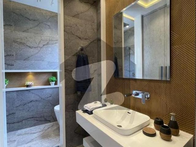 5.5 marla elegant and fully maintained super hot located corner bungalow is available in the best block of dha lahore. DHA 9 Town Block D
