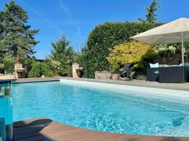 5.5 Zi. Einfamilienhaus mit Pool und Bauparzelle in Gempen