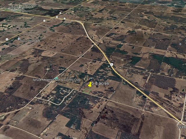 5.8 Acres With Well Backing On To Spruce Meadows Golf Course