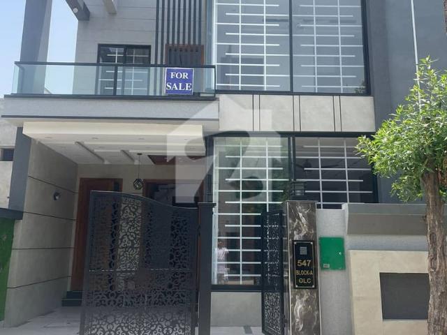 5marla brand new luxury house available for sale in bahria orchard lahore a block phase2 owenr build near masjid school market near gate 1 bahria orchard lahore community area