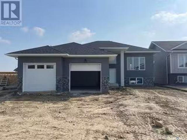 609 Pebble Beach Boulevard, Warman, SK, S0K 4S4 house for sa.