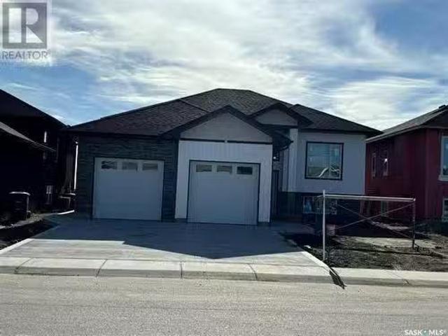 613 Pebble Beach Boulevard, Warman, SK, S0K 4S1 house for sa.