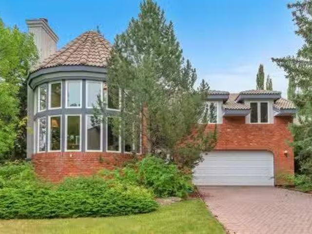 656 Coach Grove Road Sw, Calgary, AB, T3H 1C6 house for sale.
