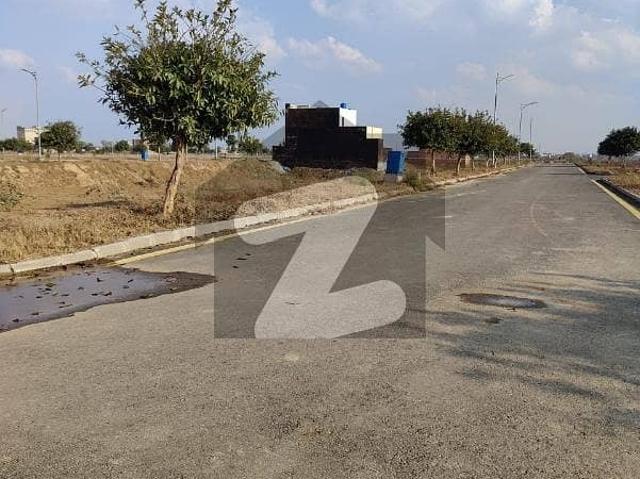 6.50 Marla On Ground Plot Carpeted Road A Block Phase 4 Location All Dues Paid