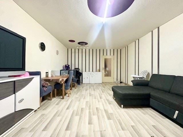 6,6% Nettorendite: Gepflegte 3 Zimmer Wohnung mit TG Stellplatz in Dietzenbach Mitte