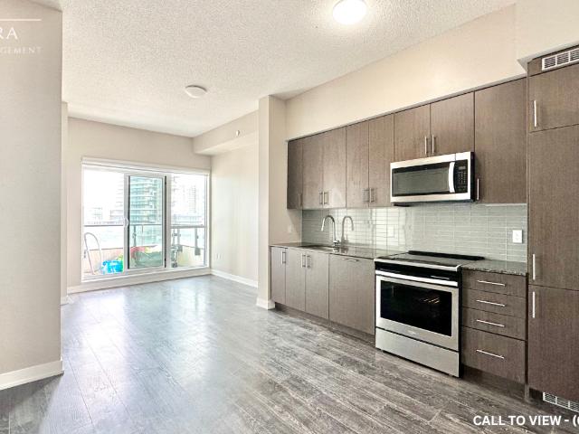 724 4055 Parkside Village Dr, Mississauga, Ontario L5B 0K8 MODERN 1+DEN CONDO WITH STUNNING CITY, LAKE AND CONSERVATION VIEWS Condo for Rent