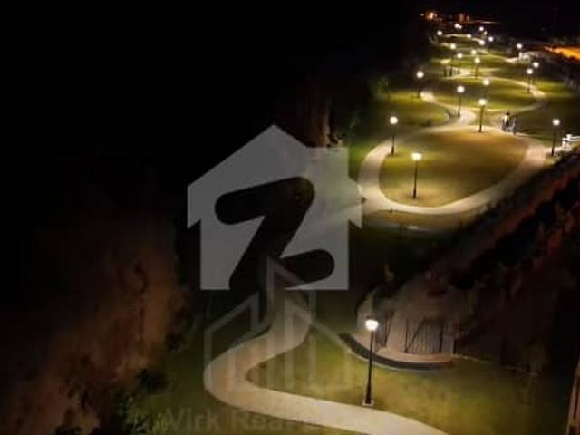 8 Marla Heighted & Non Corner with extra land not paid 2m Plot For Sale On Urgent Basis On Investor Rate In Sector B Near Family Park In DHA 03 Islamabad
