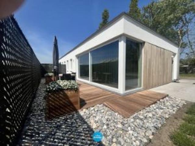 8 luxueuze halfopen vakantiewoningen te Westende, Lombard.