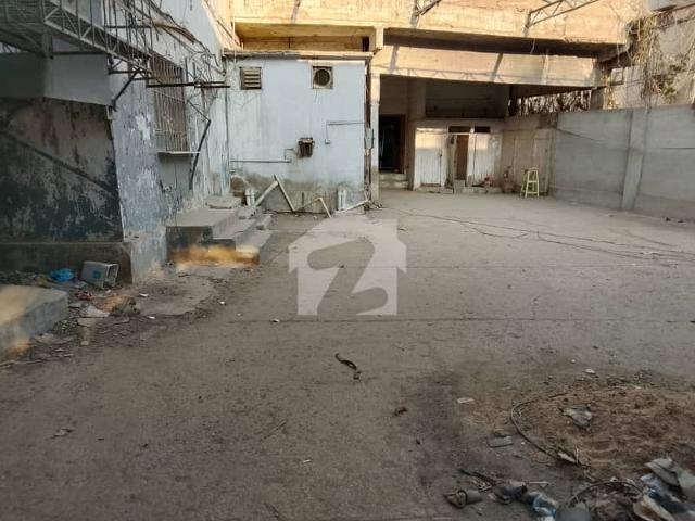 1000 Square Yards In KDA Scheme 1 Near Tipu Sultan Main Road Karsaz Road Demolished Condition