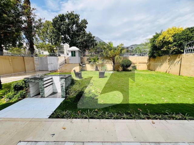 1000 SQYD With Front Back Lush garden 3 Beds Beautiful House Available For Rent in E 7