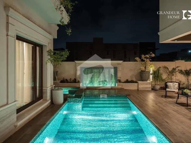 1000 Yards Brand New Top Quality Furnished Bungalow With Pool Basement Prime Location Available For Sale