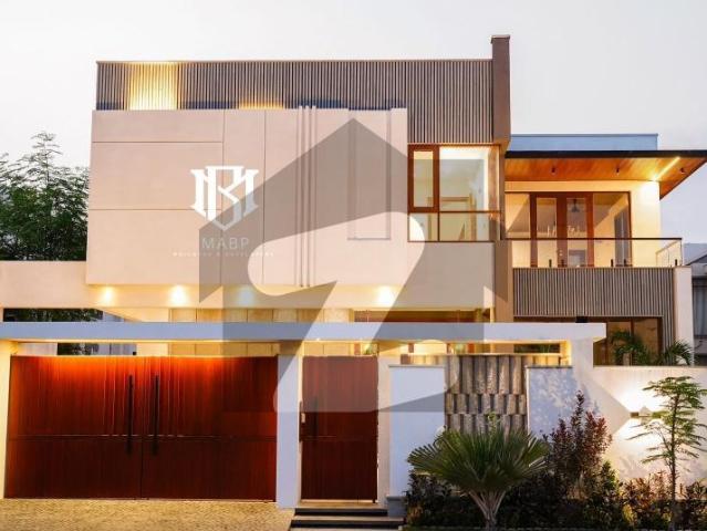 1000 Yards Brand New Khayaban E Qasim Designer Furniture Italian Kitchen With Italian Appliances Spanish Tiles And Intricate Marbles 2 Servent Quarters Swimming Pools And Also Lift. DHA Phase 8