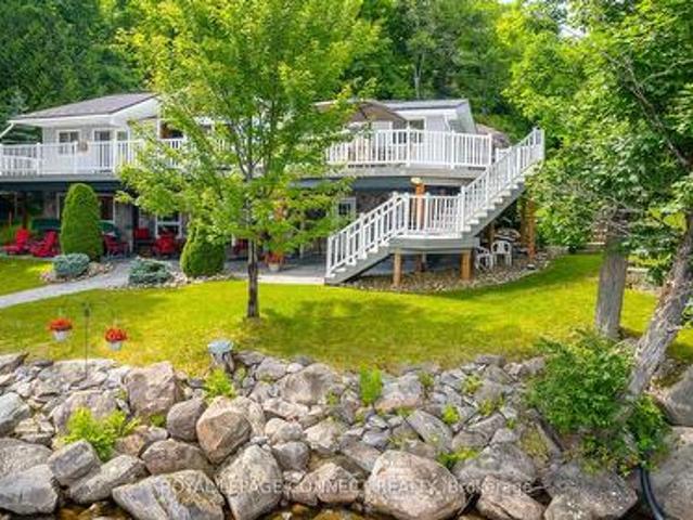 1019 Carnation Lane, Dysart Et Al, ON, K0M 1S0 Luxury House for sale | Listing ID X12258 | Royal LePage Carriage Trade Luxury Properties