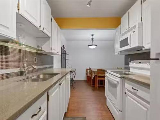 103 1229 Bernard Avenue, Kelowna, BC, V1Y 6R3 Single Family.