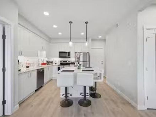104 660 Shawnee Square Sw, Calgary, AB, T2Y 2N6 condo for sa.