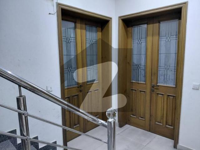 10 Marla Tile floor house for rent Wapda Town Phase 1