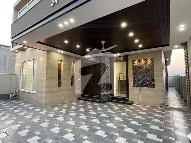 10 Marla Beautiful Brand New House Available For Sale just 1 Mnt Drive From the Main Gate!