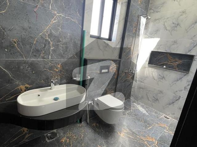 10 Marla Brand New Corner House Available For Rent DHA Phase 1 Sector U