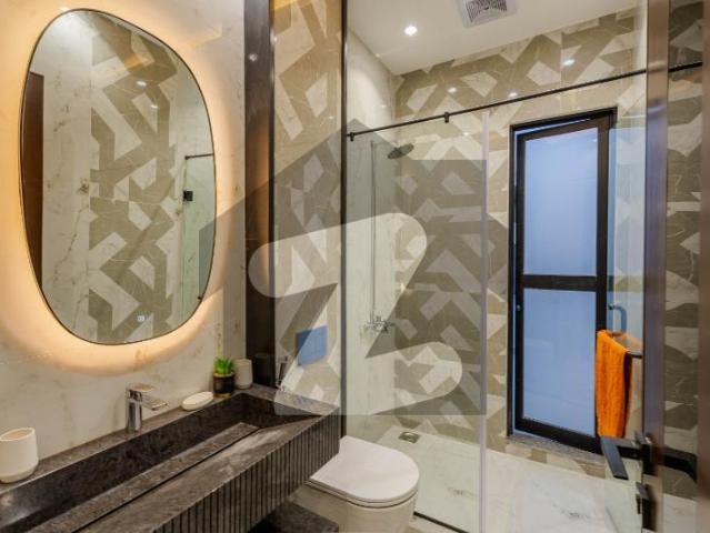 10 Marla Modern Houe For Rent With 7 KV Solar Hot Location Near Commercial Park DHA Phase 5