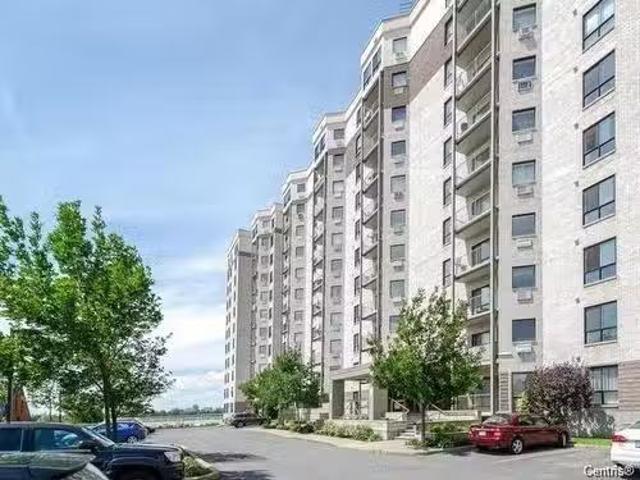 1107 7680 Boul. Marie Victorin, Brossard, QC, J4W 3L2 condo.