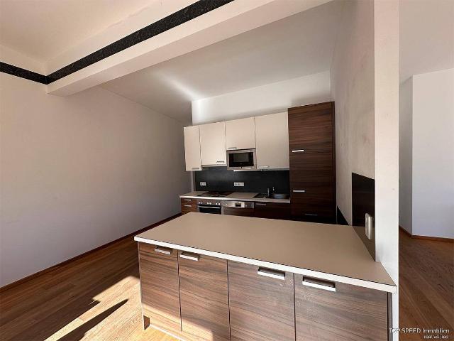 113,07m² Dachgeschoßwohnung im Wohn und Geschäftshaus Facade