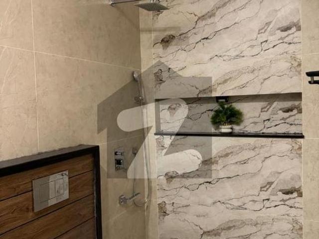 11Marla Double height Designer house for sale C block Main Double road B 17 Islamabad MPCHS Block C
