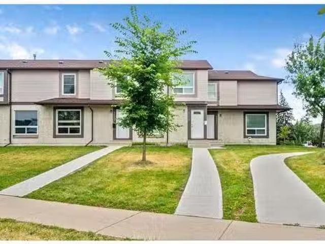 1219 137 Avenue Se, Calgary, AB, T2J 6N5 townhouse for sale.